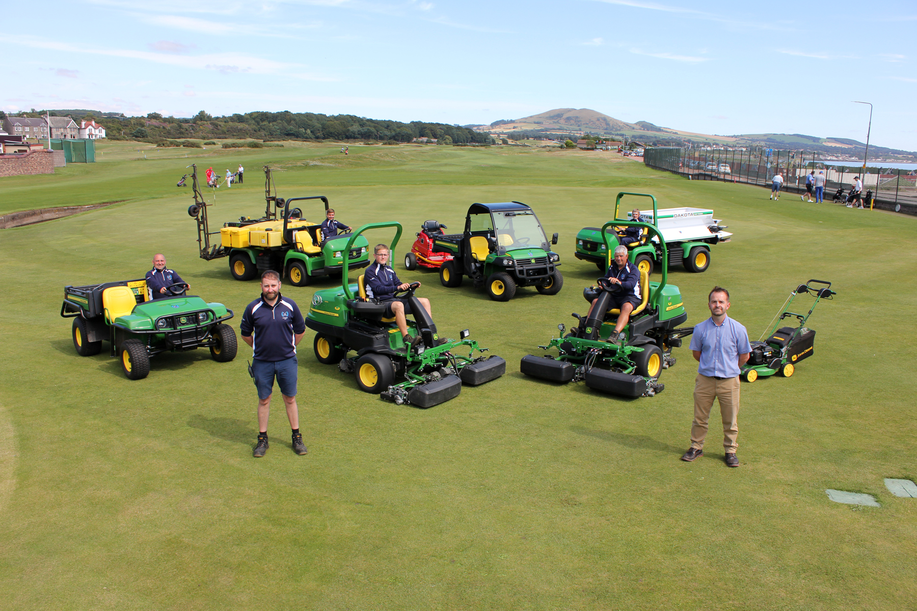 Leven Links course manager David Gray and Double A golf specialist John Bateson with the rest of the greenkeeping team and the new machinery fleet. 